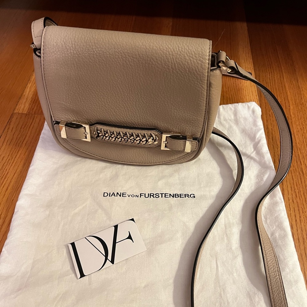 Tan DVF bag with gold buckle